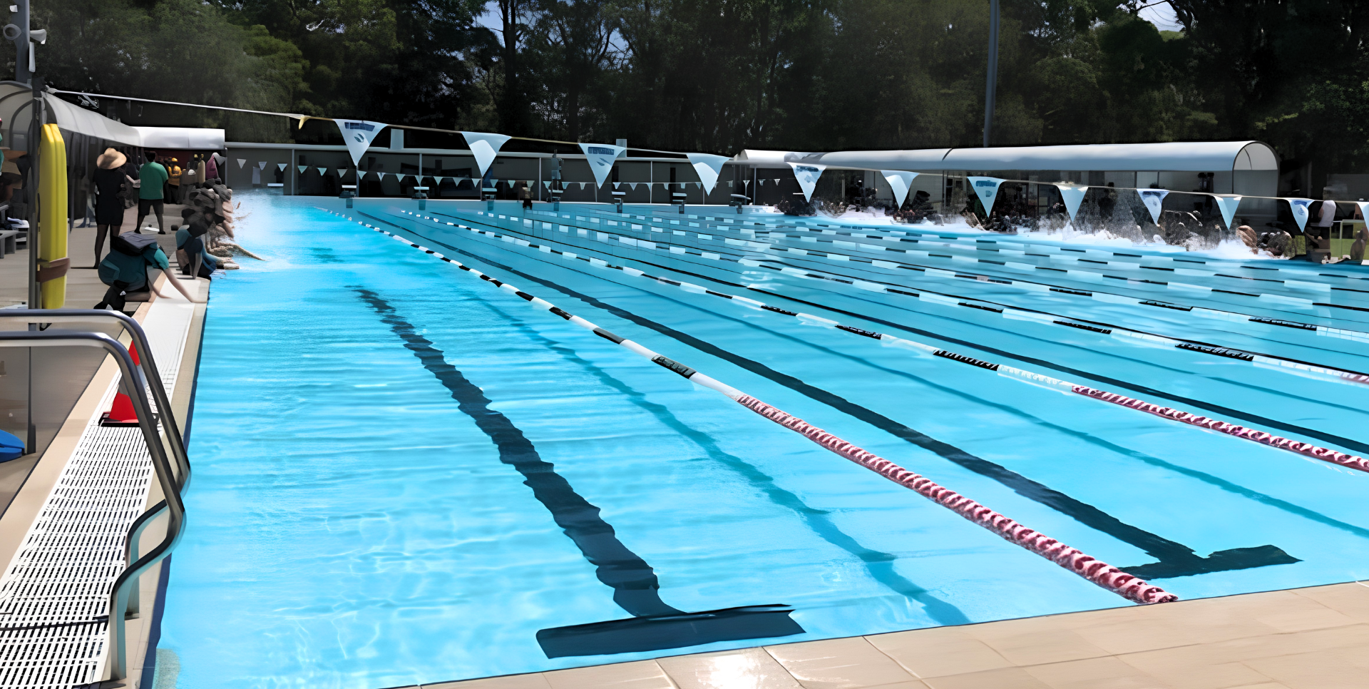 Image features the Tomaree Aquatic Centre 50-metre heated Swimming Pool. Clear blue pool water.